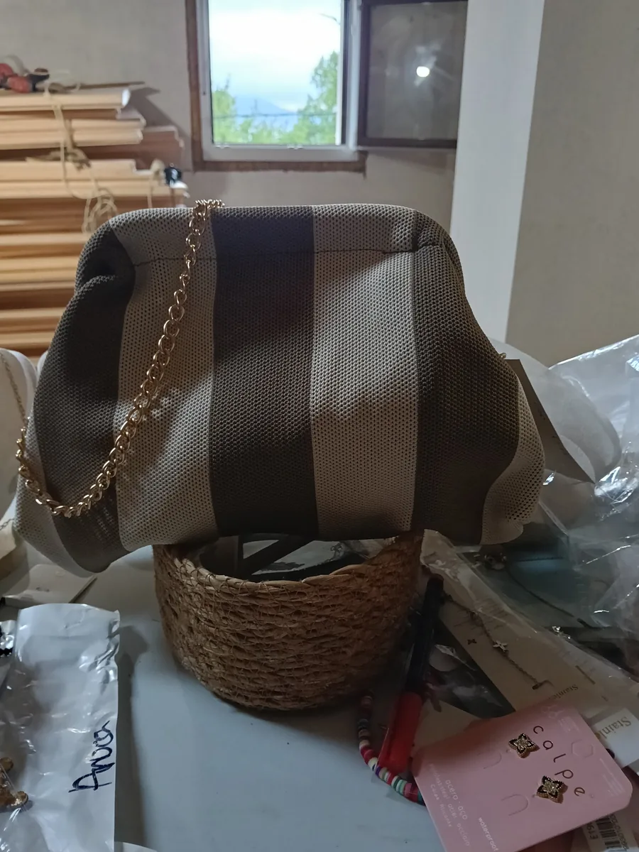 Bolso Clutch de Rayas en Topo y marrón